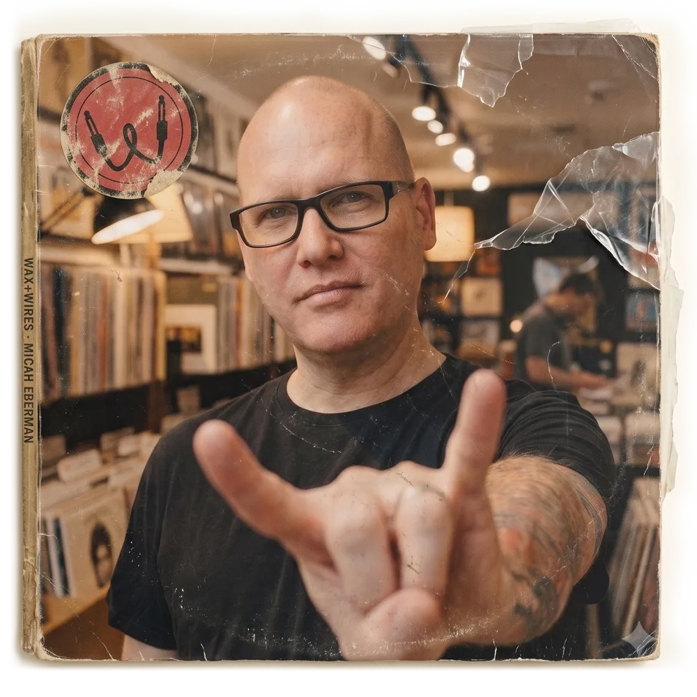 Micah Eberman in a record shop, throwing the horns, styled as a worn Wax+Wires record sleeve.